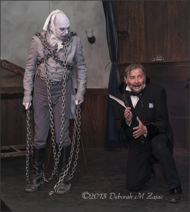 The Ghost Jacob Marley warns Ebenezer Scrooge of the awful fate