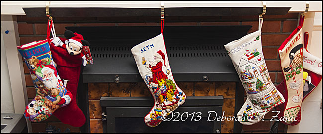 The Stockings were hung by the Chimney with care.