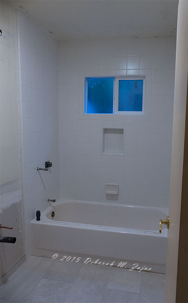 Day 7 Hall Bath Grout tile set vanity and wall trim