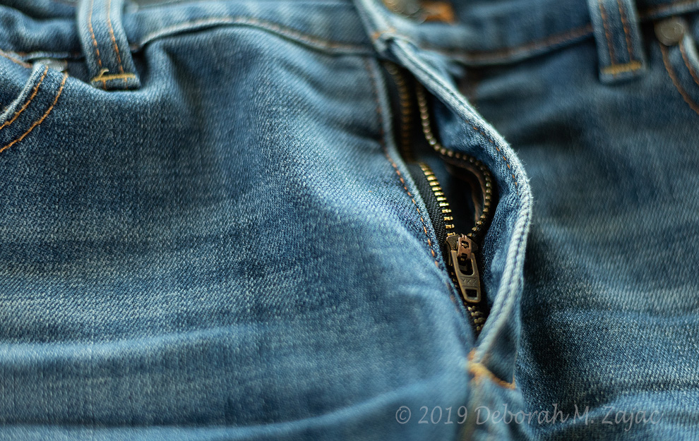 Open Zipper on Blue Jeans